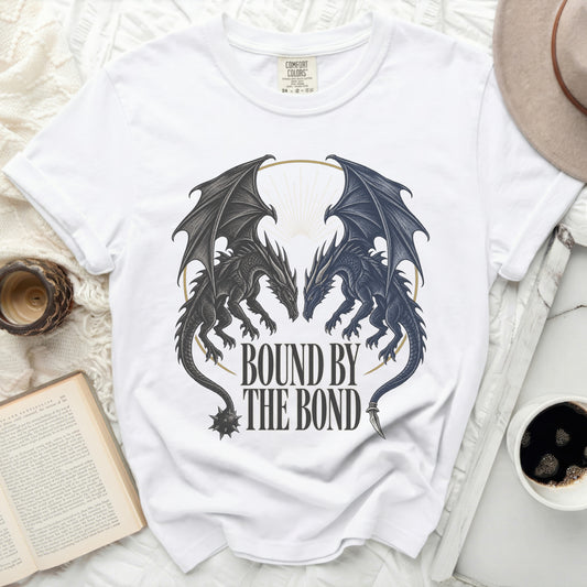 White t-shirt with two dragons facing each other, text "BOUND BY THE BOND".