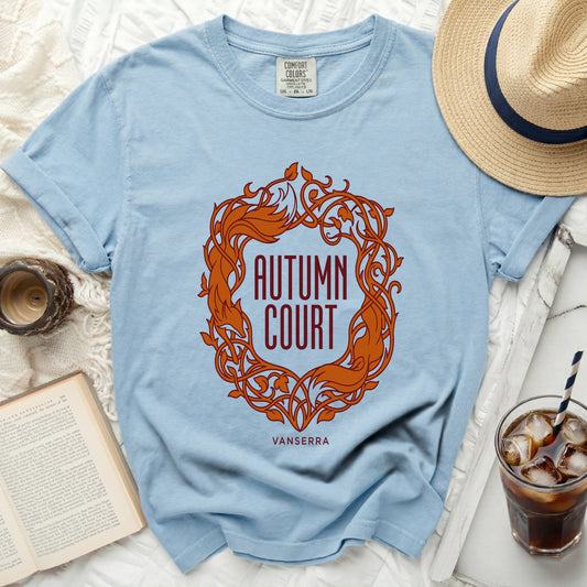 Light blue t-shirt with "Autumn Court Vanserra" design and foliage.