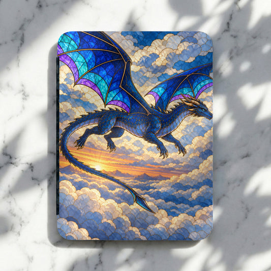 Blue dragon with stained glass wings flying through clouds at sunset.