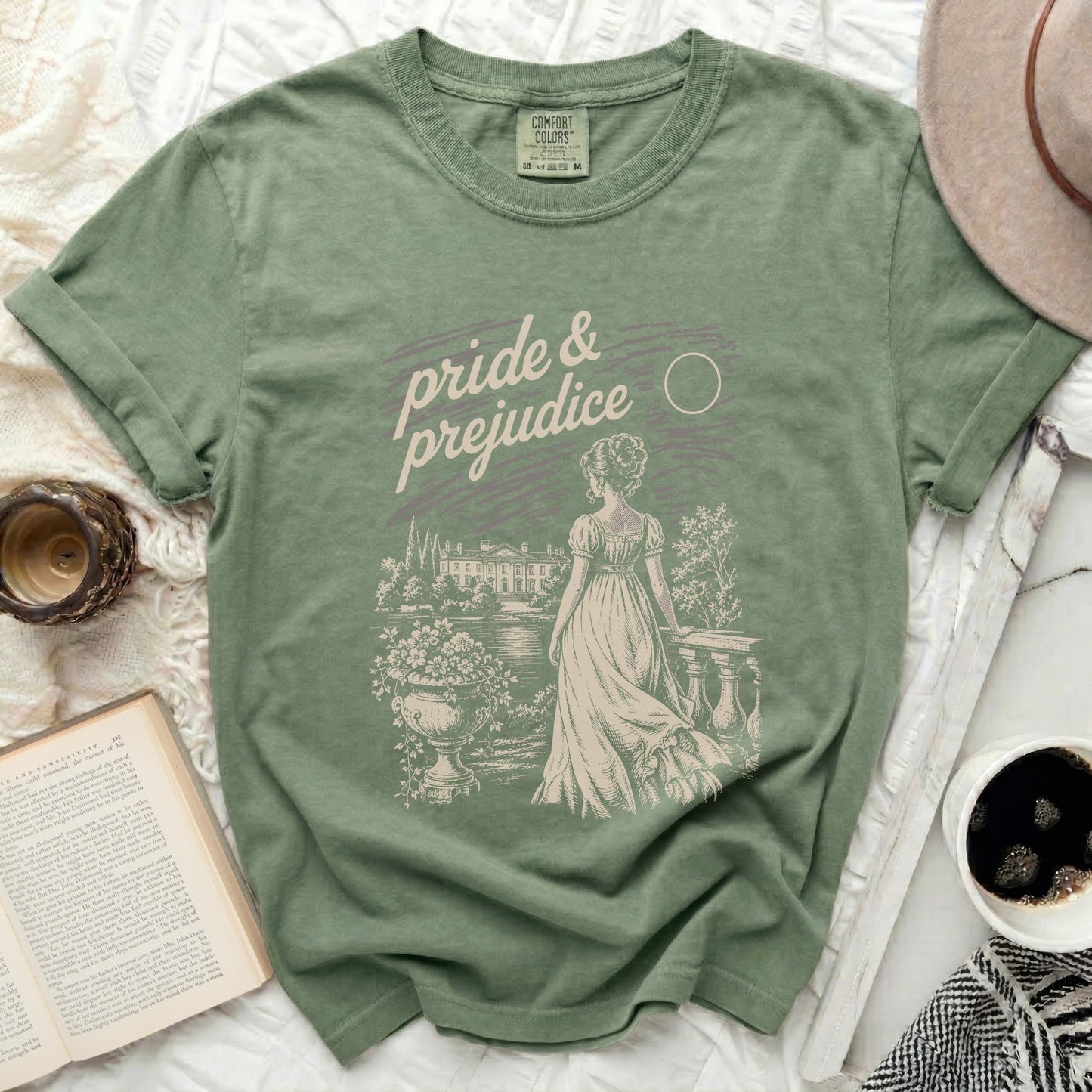 Green t-shirt with "Pride & Prejudice" text and vintage illustration.