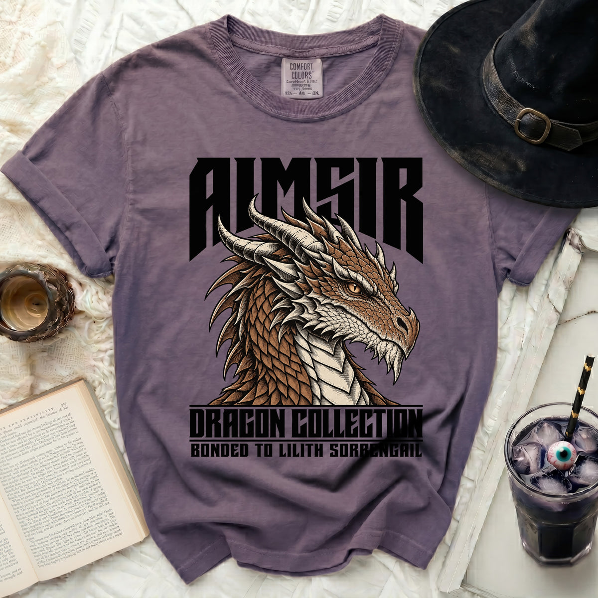 Purple t-shirt with a dragon graphic and text "AIMSR DRAGON COLLECTION BONDED TO LILITH SORRENGAIL".