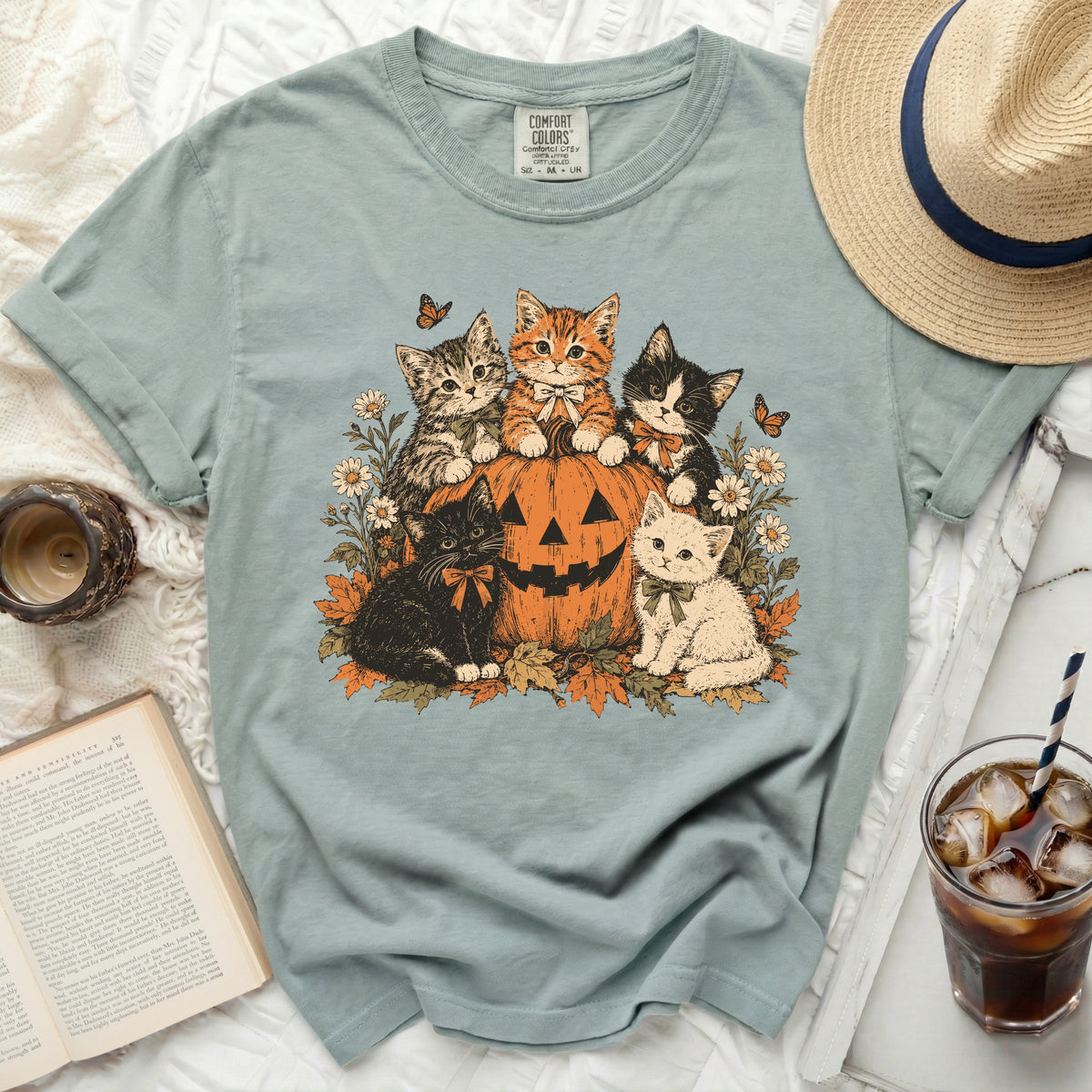 T-shirt with five kittens and a pumpkin graphic, with text "COMFORT COLORS".