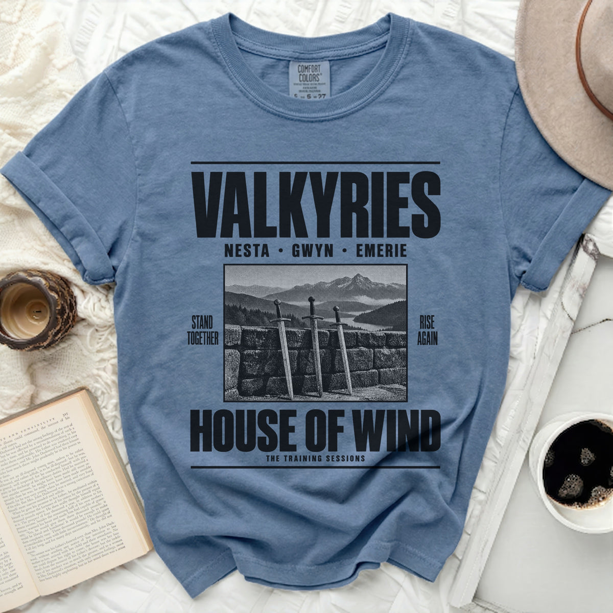 Blue t-shirt with "Valkyries House of Wind" text and sword graphic.
