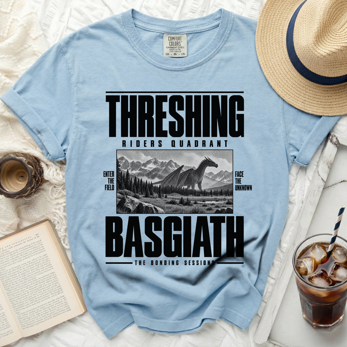 Light blue Comfort Colors t-shirt with "THRESHING RIDERS QUADRANT BASGIATH THE BONDING SESSIONS" text.