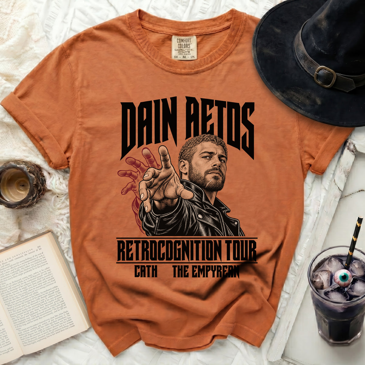 Orange t-shirt with Dain Aetos "Retrognition Tour" graphic.