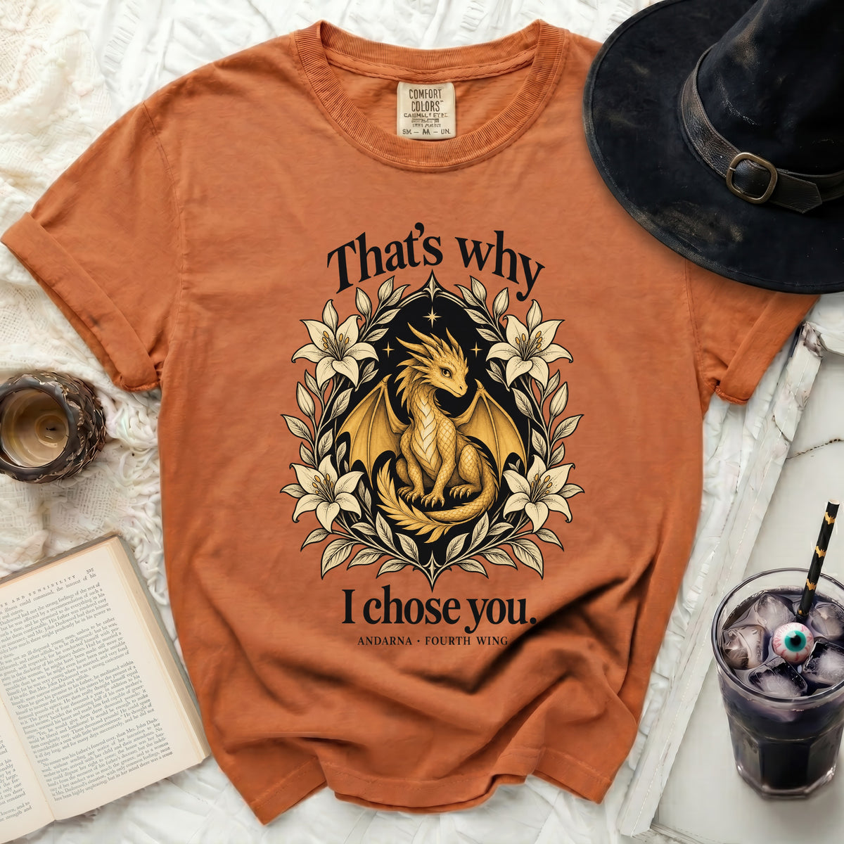 Orange t-shirt with golden dragon, lilies, and text "That's why I chose you."