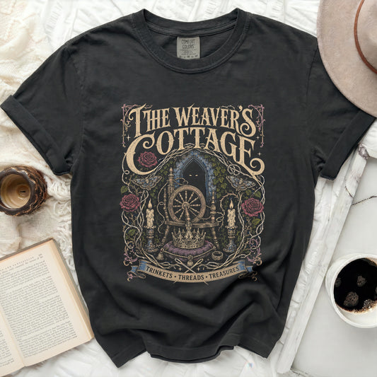 Black Comfort Colors t-shirt with "The Weaver's Cottage" mystical graphic design.
