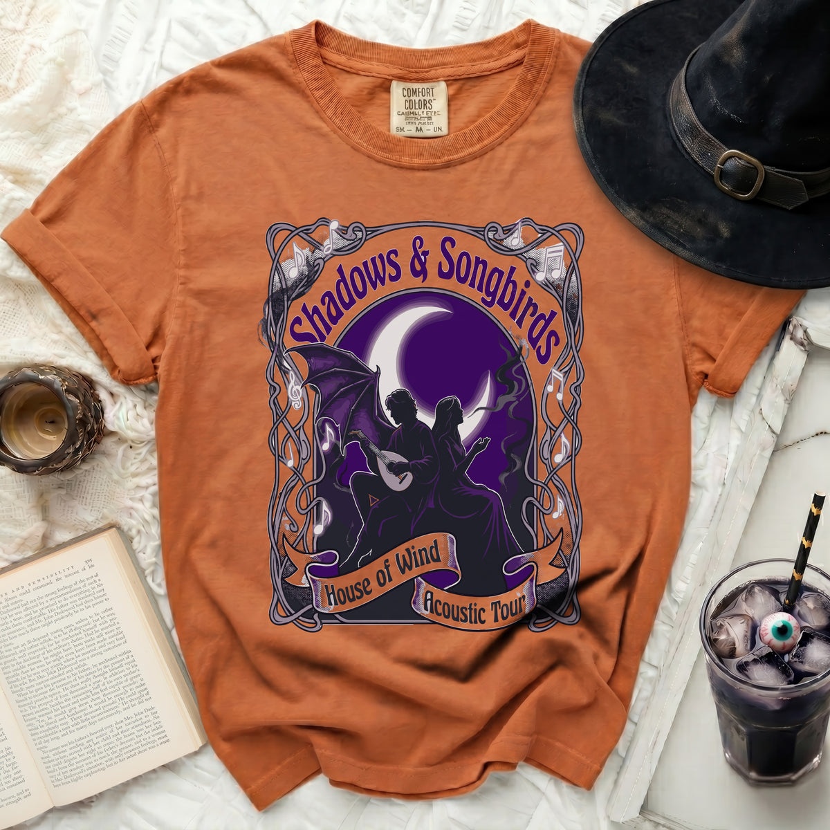 Orange t-shirt with "Shadows & Songbirds" and "House of Wind Acoustic Tour" graphic.