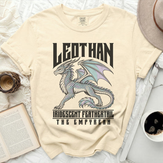 Cream t-shirt with text "LEDTHAN" and iridescent dragon graphic.