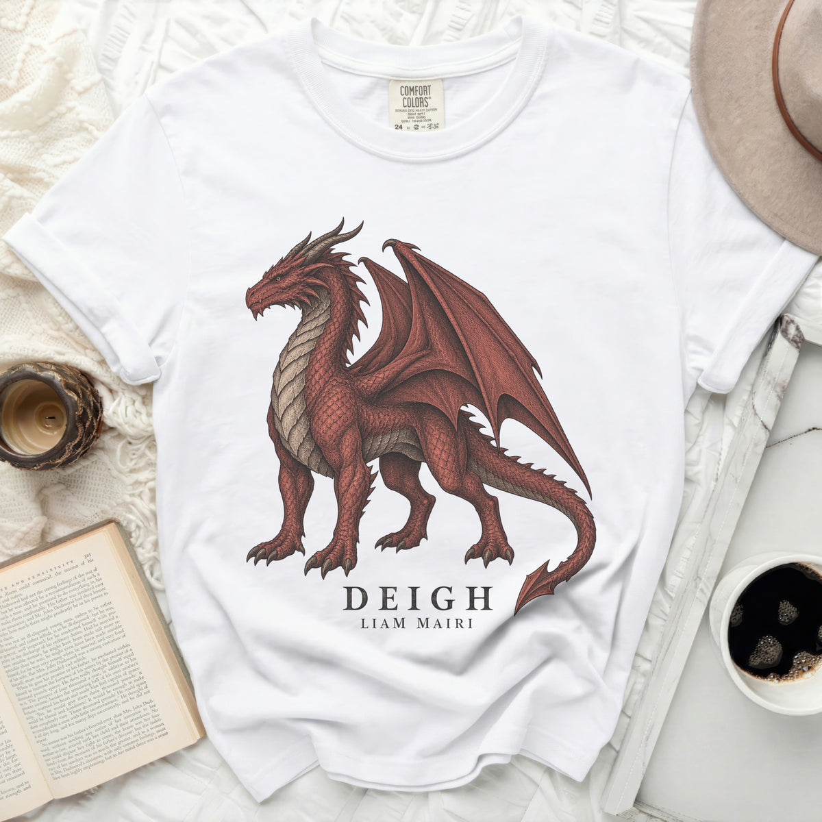 White t-shirt with a red dragon graphic and text DEIGH LIAM MAIRI.