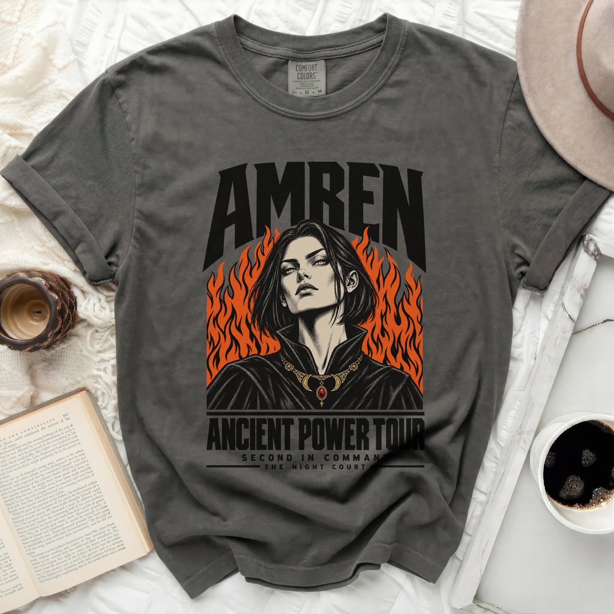 Amren t-shirt with woman and flames graphic, "Ancient Power Tour" text.
