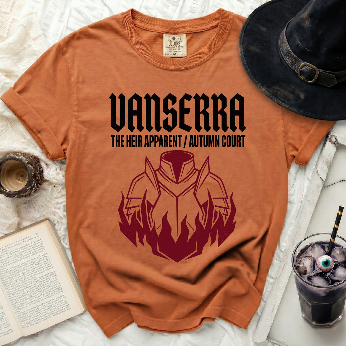 Orange t-shirt with Vanserra, The Heir Apparent/Autumn Court text and armor graphic.