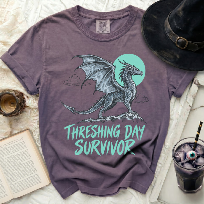 Purple Comfort Colors t-shirt with dragon graphic and text "THRESHING DAY SURVIVOR".