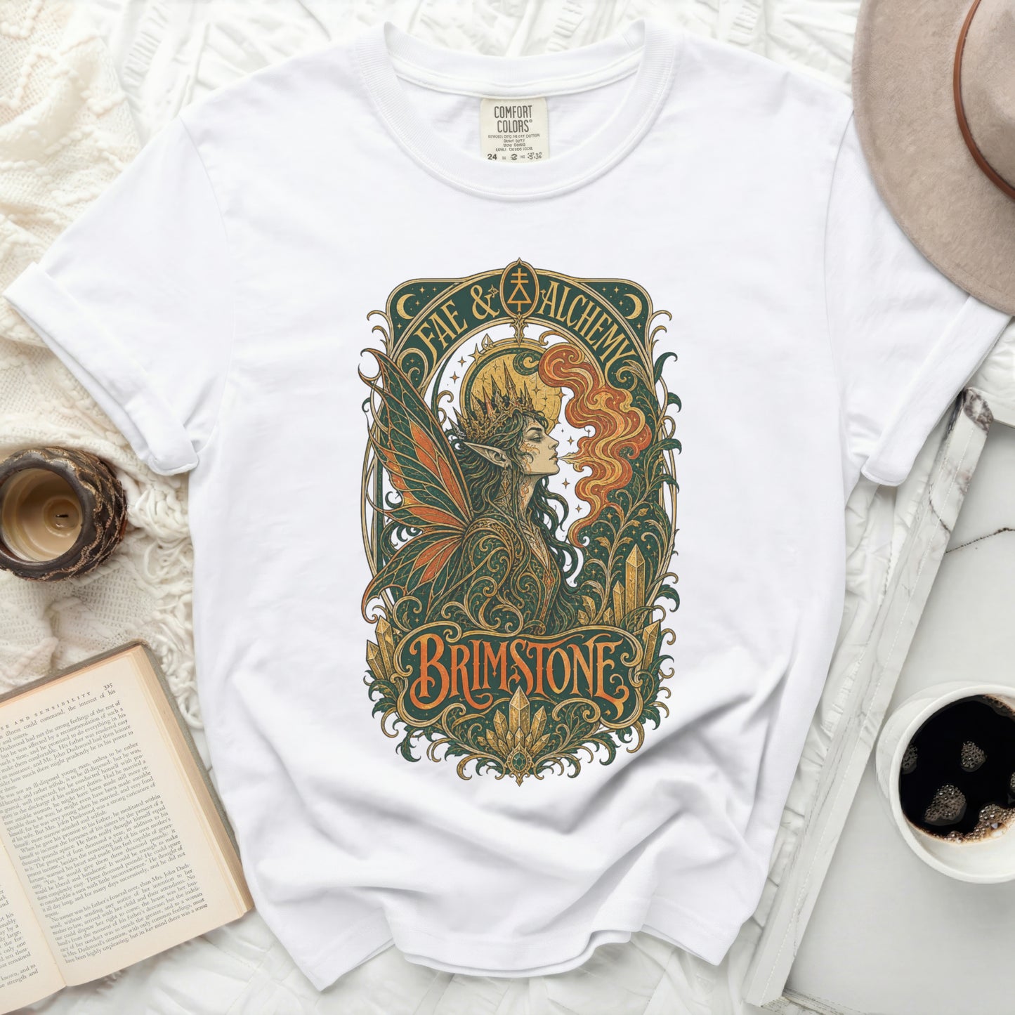 White t-shirt with "FAE & ALCHEMY" and a fairy illustration.