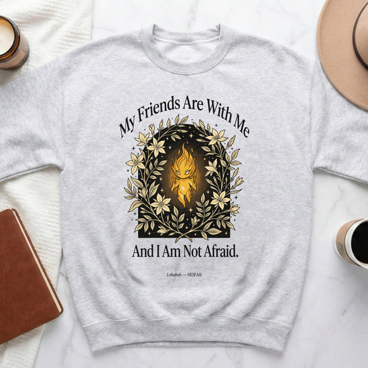 Light-colored sweatshirt with floral wreath and text "My Friends Are With Me And I Am Not Afraid."
