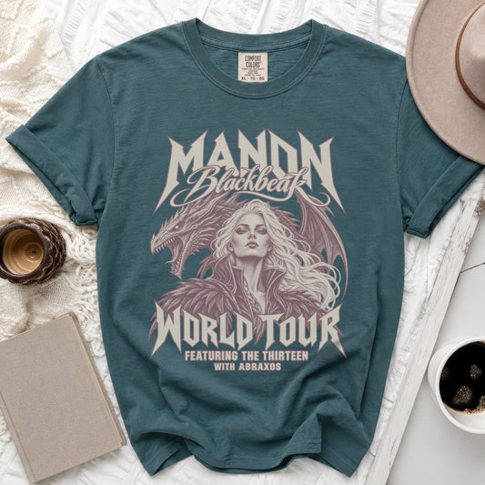 Teal t-shirt with "Manon Blackbeak World Tour" featuring a woman and dragon graphic.