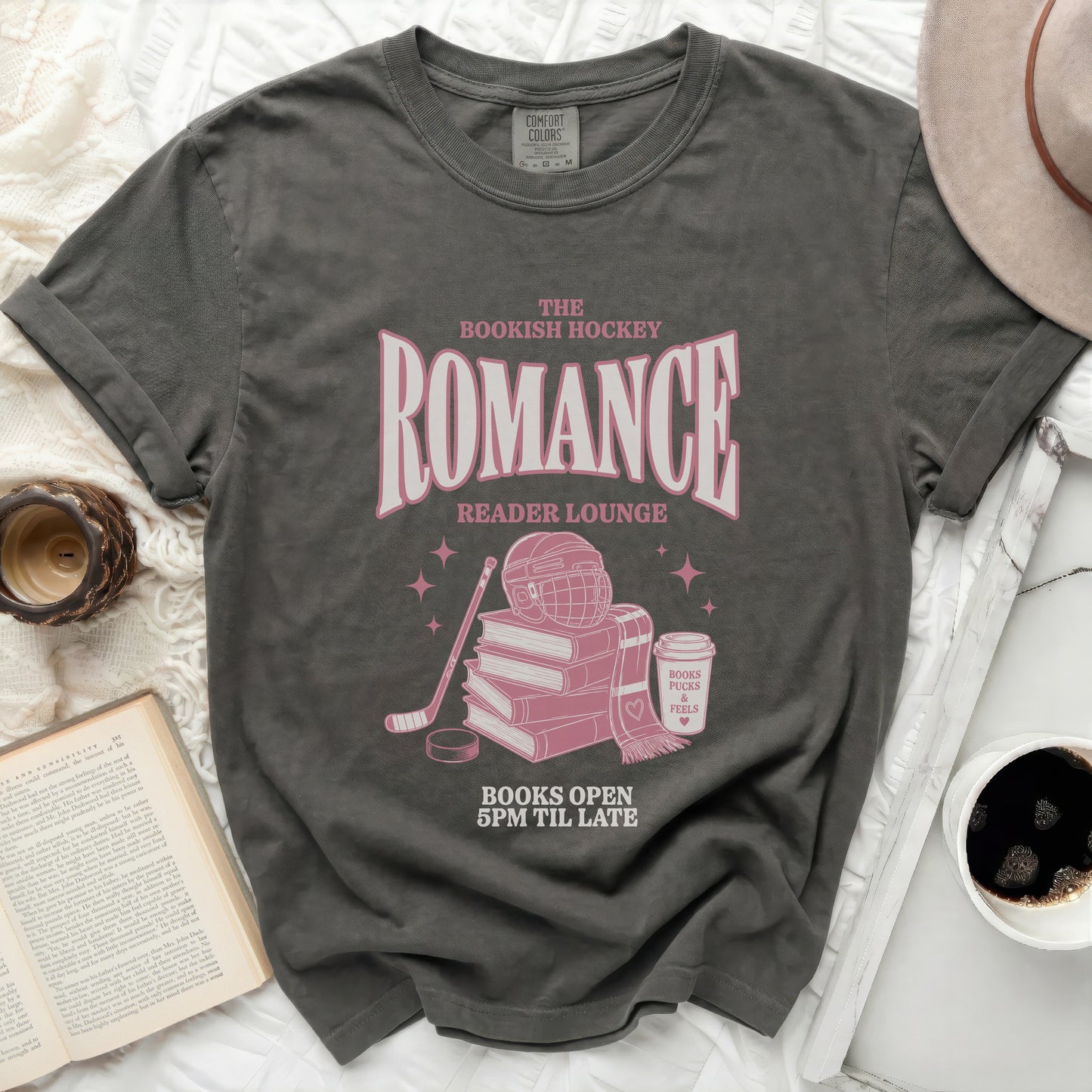 T-shirt with "Bookish Hockey Reader Lounge" and hockey elements.