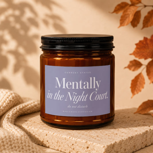 Amber jar candle with label reading "Mentally in the Night Court. do not disturb."