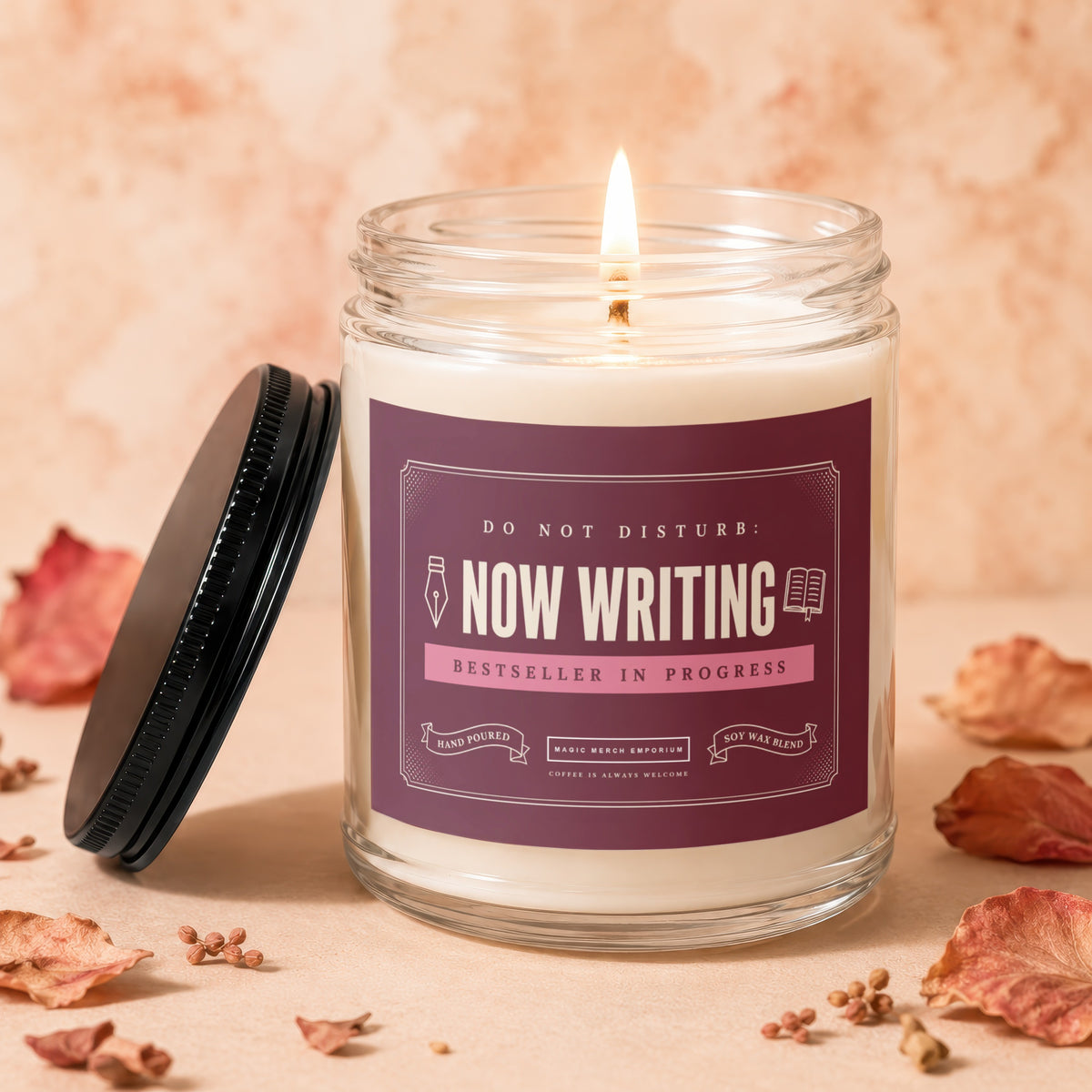 Candle with "Now Writing Bestseller In Progress" label and a lit flame.