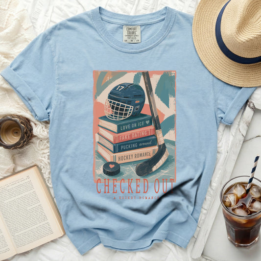 Light blue t-shirt with "Checked Out A Hockey Romance" graphic.