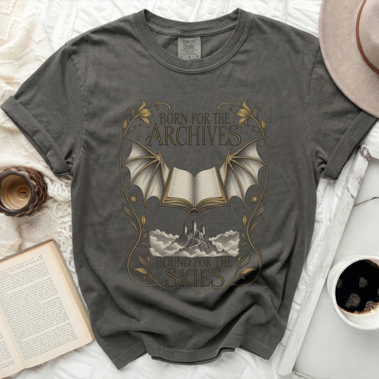 Dark grey t-shirt with "Born for the Archives, Bound for the Skies" text and a castle.