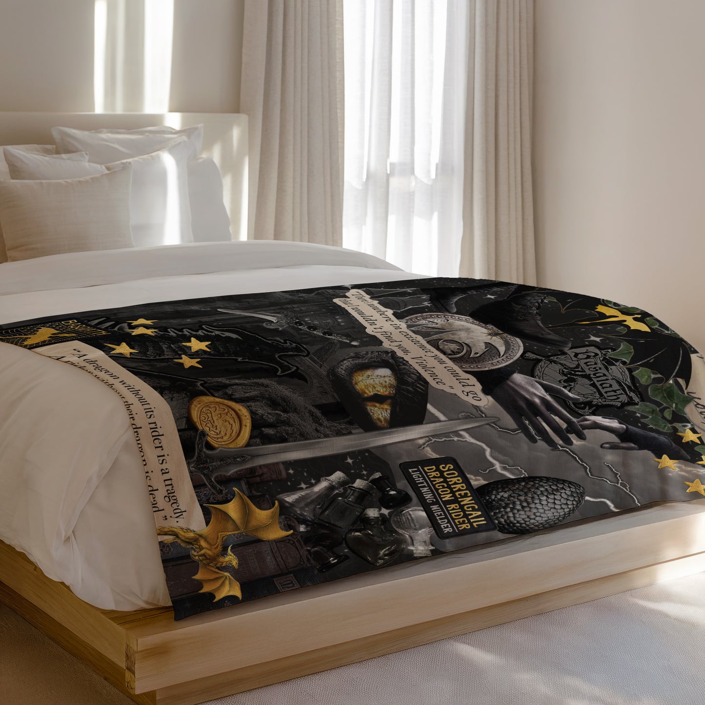Fantasy collage comforter with dragons, swords, stars, and text.