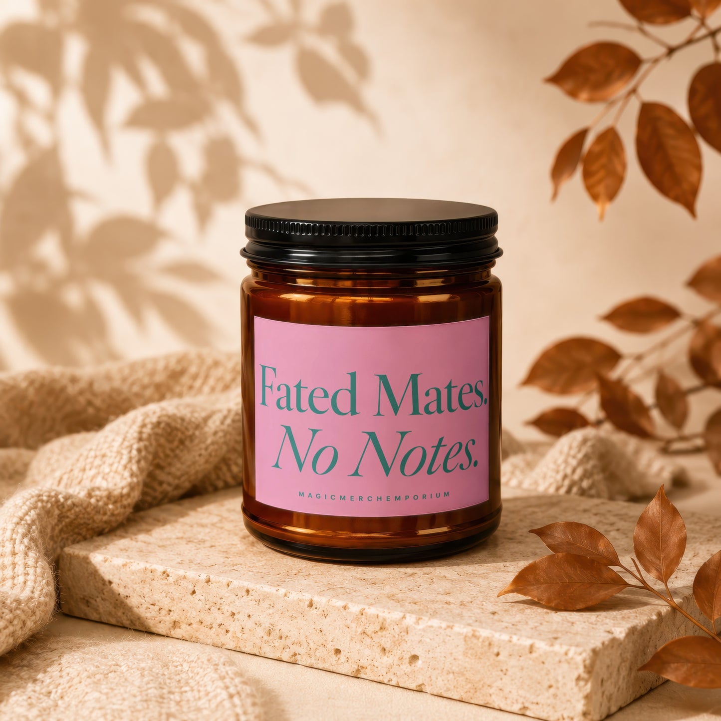 Amber candle with pink label reading "Fated Mates. No Notes."