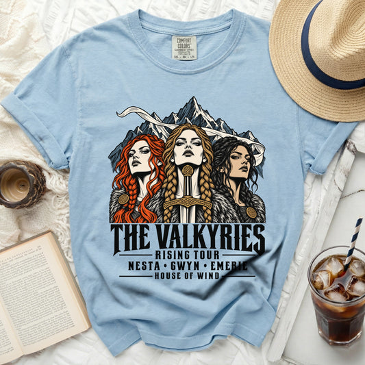 Light blue t-shirt featuring "The Valkyries Rising Tour" graphic with three women.