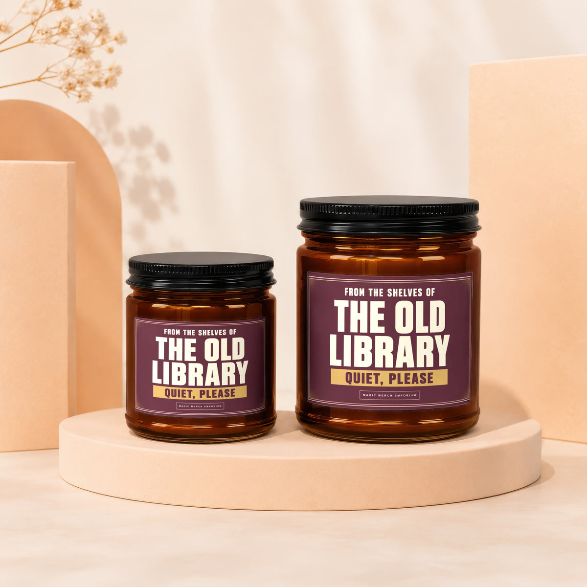 Two amber glass candles labeled "The Old Library Quiet, Please".