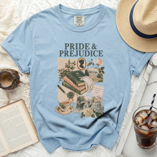 Light blue t-shirt with "Pride & Prejudice" graphic and vintage elements.