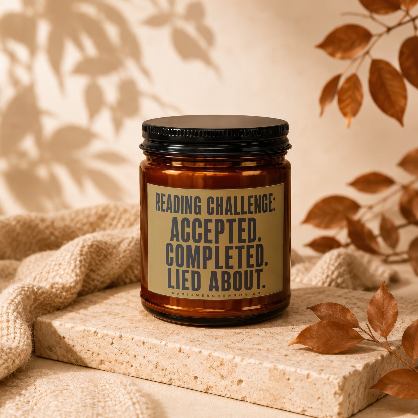 Amber jar candle with lid, featuring text "Reading Challenge: Accepted. Completed. Lied About."