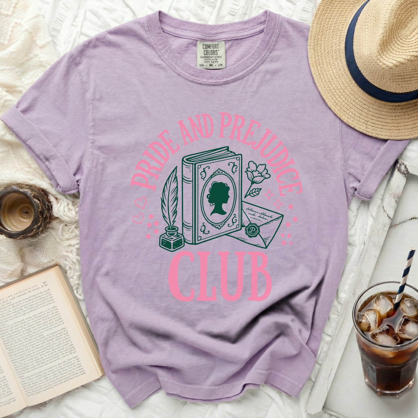 Lavender t-shirt with "Pride and Prejudice Club" graphic.