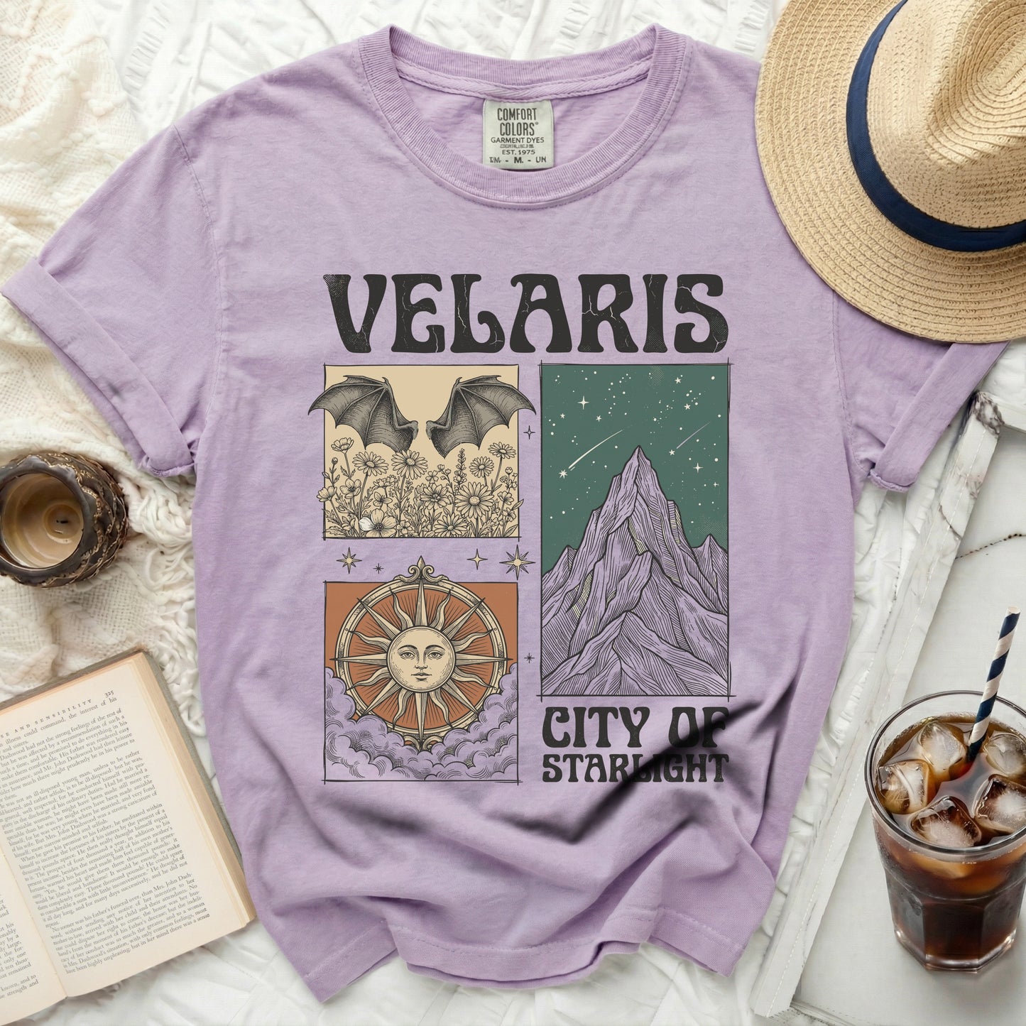 Velaris City of Starlight graphic tee with bat, mountain, and sun designs.