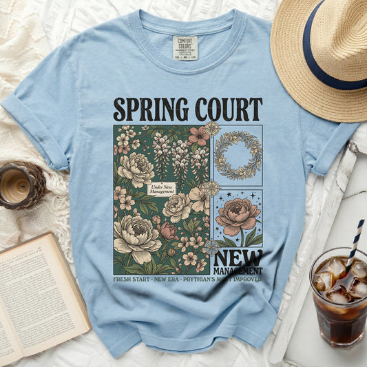 Light blue t-shirt with "Spring Court" and floral designs.
