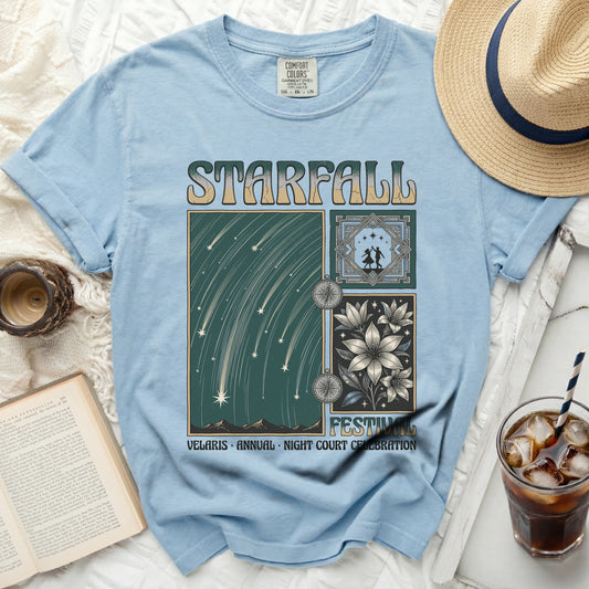 Light blue t-shirt with "STARFALL" and "VELARIS ANNUAL NIGHT COURT CELEBRATION" text.