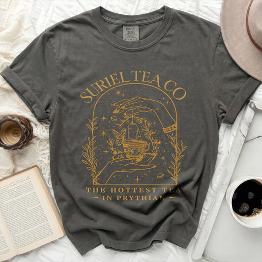 Dark grey t-shirt with gold "Suriel Tea Co. The Hottest Tea in Prythian" graphic.