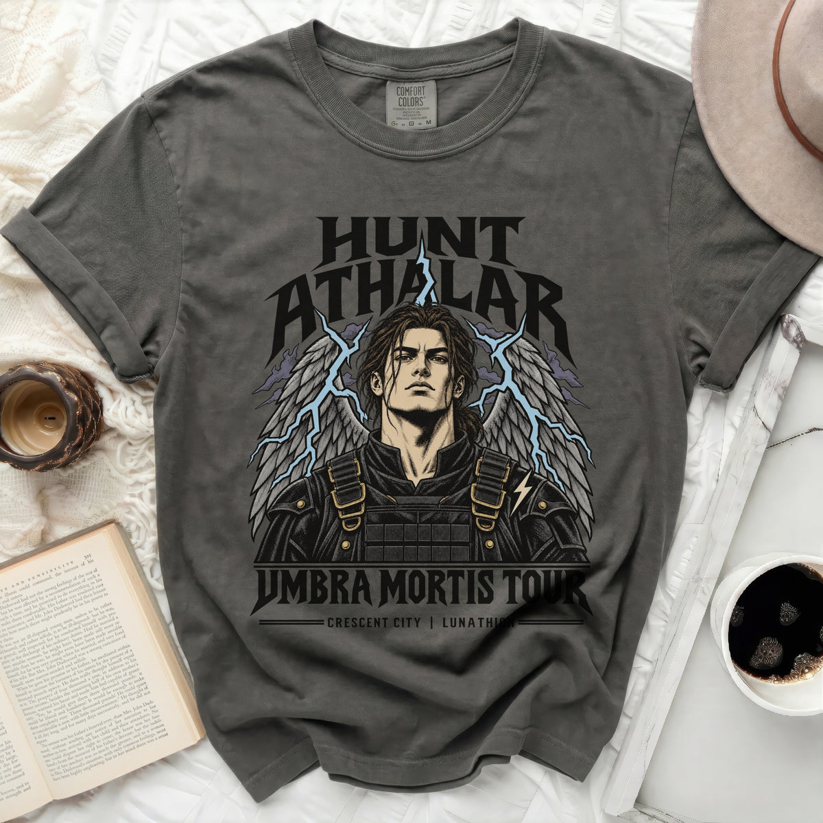 Dark grey Comfort Colors t-shirt with Hunt Athalar graphic and "Umbra Mortis Tour" text.
