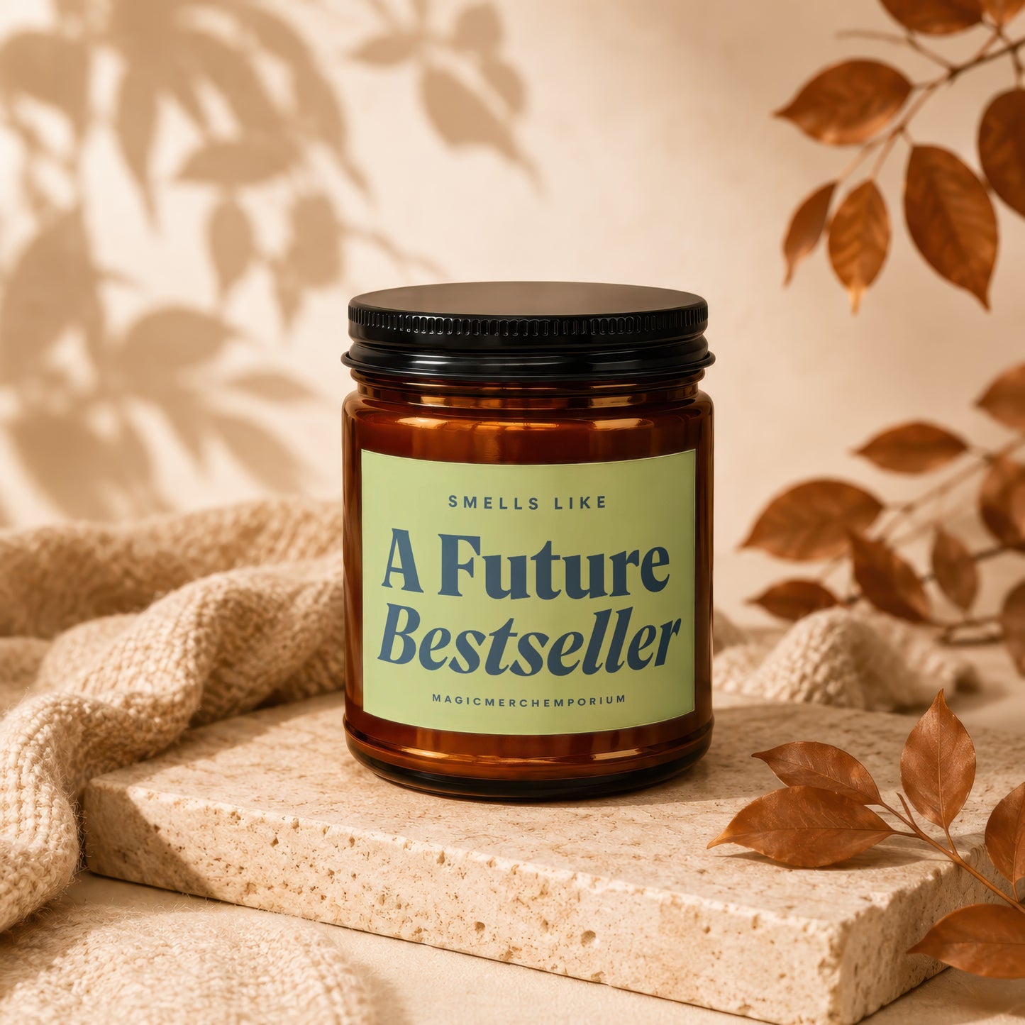 Amber jar candle with a light green label that reads "Smells Like A Future Bestseller."