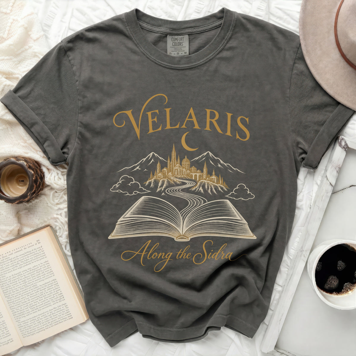 Dark grey t-shirt with "Velaris Along the Sidra" text and a city landscape.