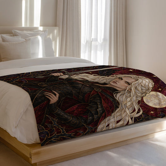 Iron Queen Velveteen Plush Blanket on a bed