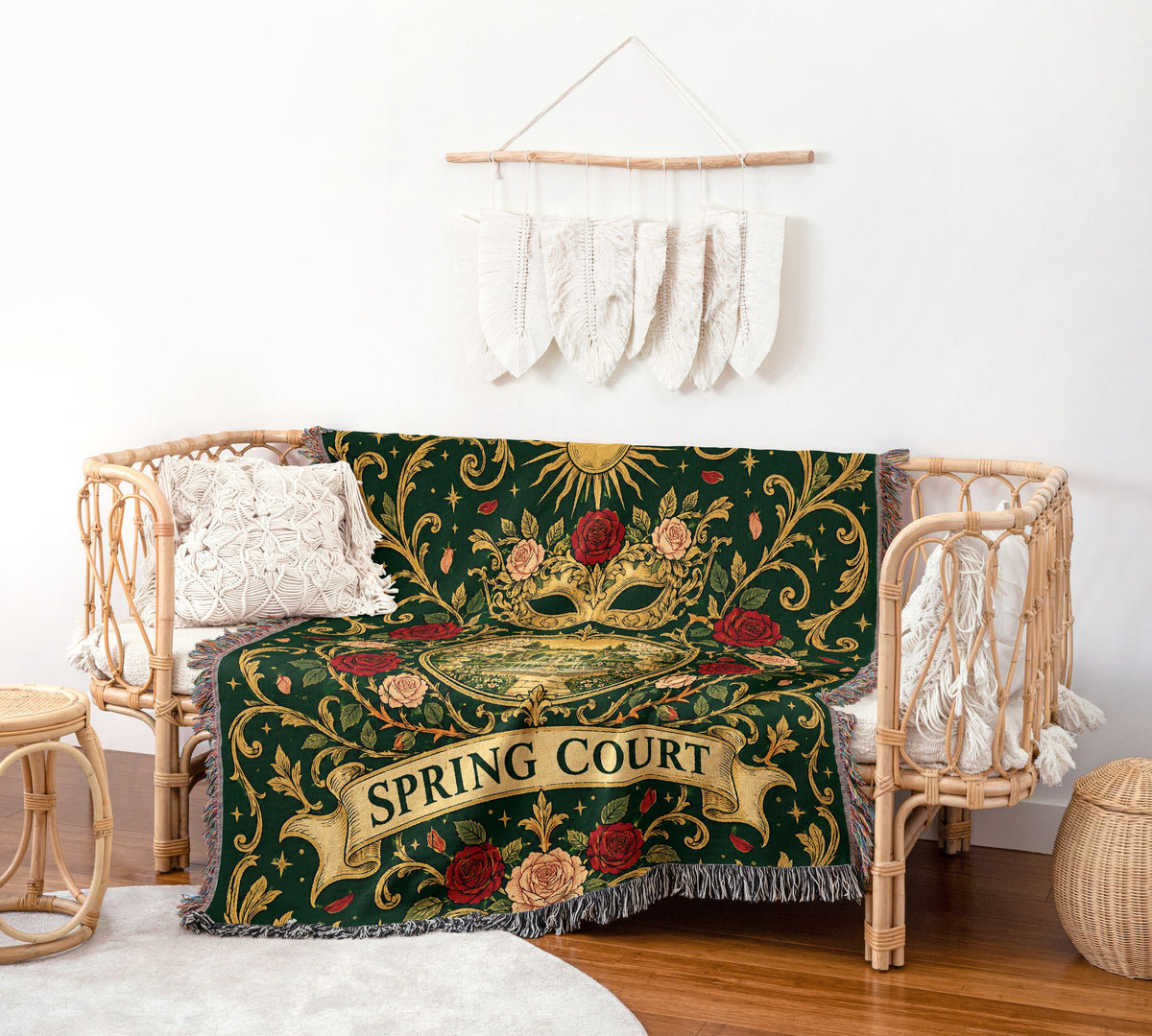Spring Court Masquerade Crest Woven Throw Blanket on a rattan chair