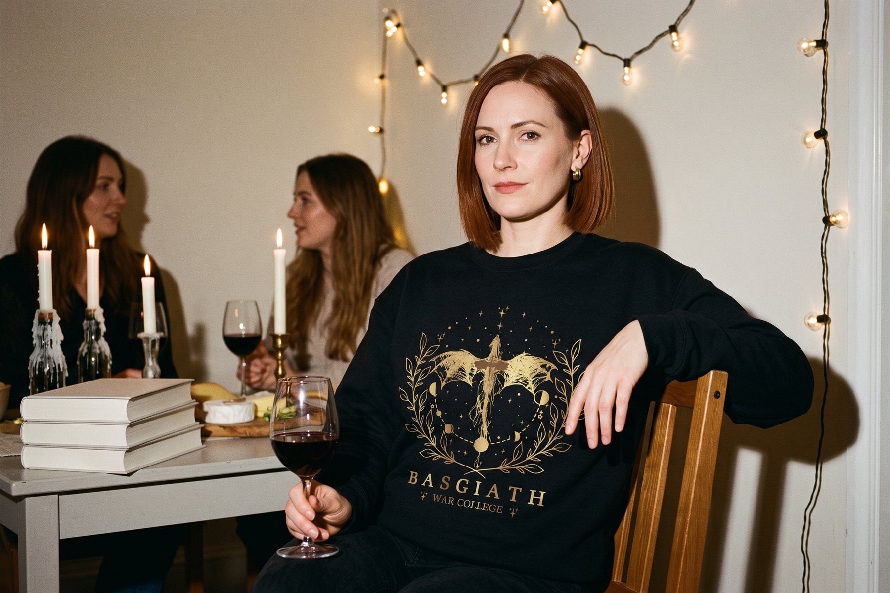 Fourth Wing Basgiath sweatshirt at a candlelit book club night