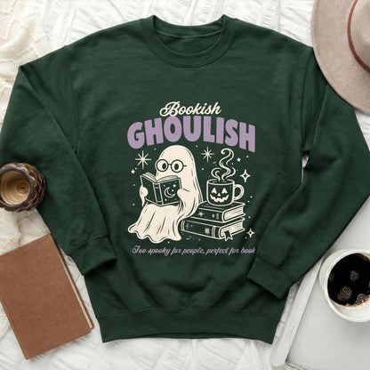 Green sweatshirt with ghost reading, drinking coffee, and books design.