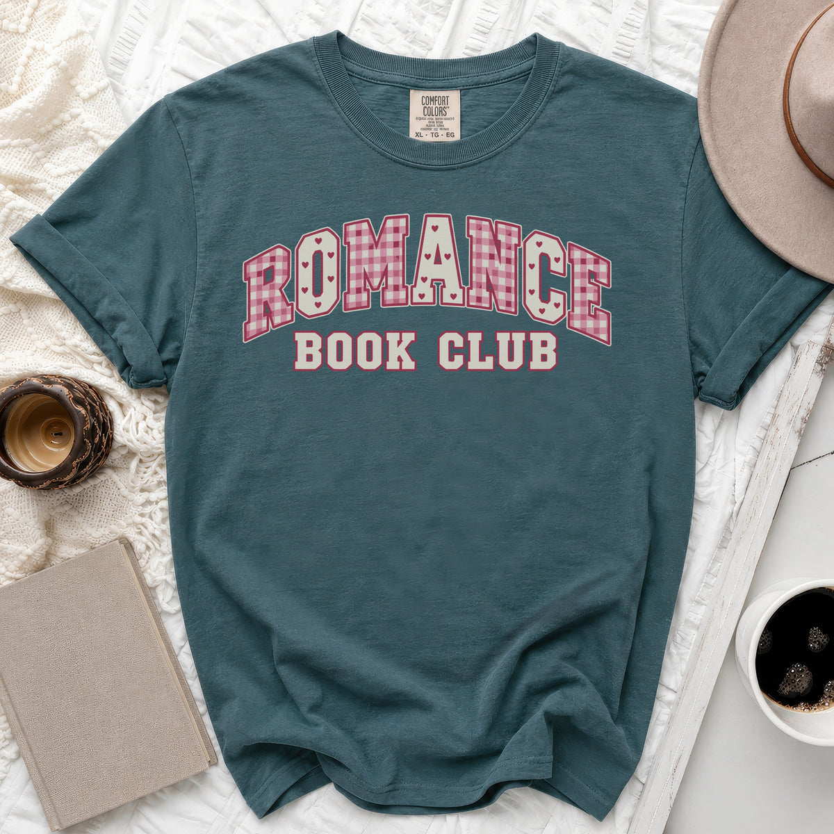 Teal t-shirt with "ROMANCE BOOK CLUB" text in pink gingham.