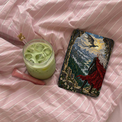 Book cover featuring woman with red cape, dragon, and mountain landscape.