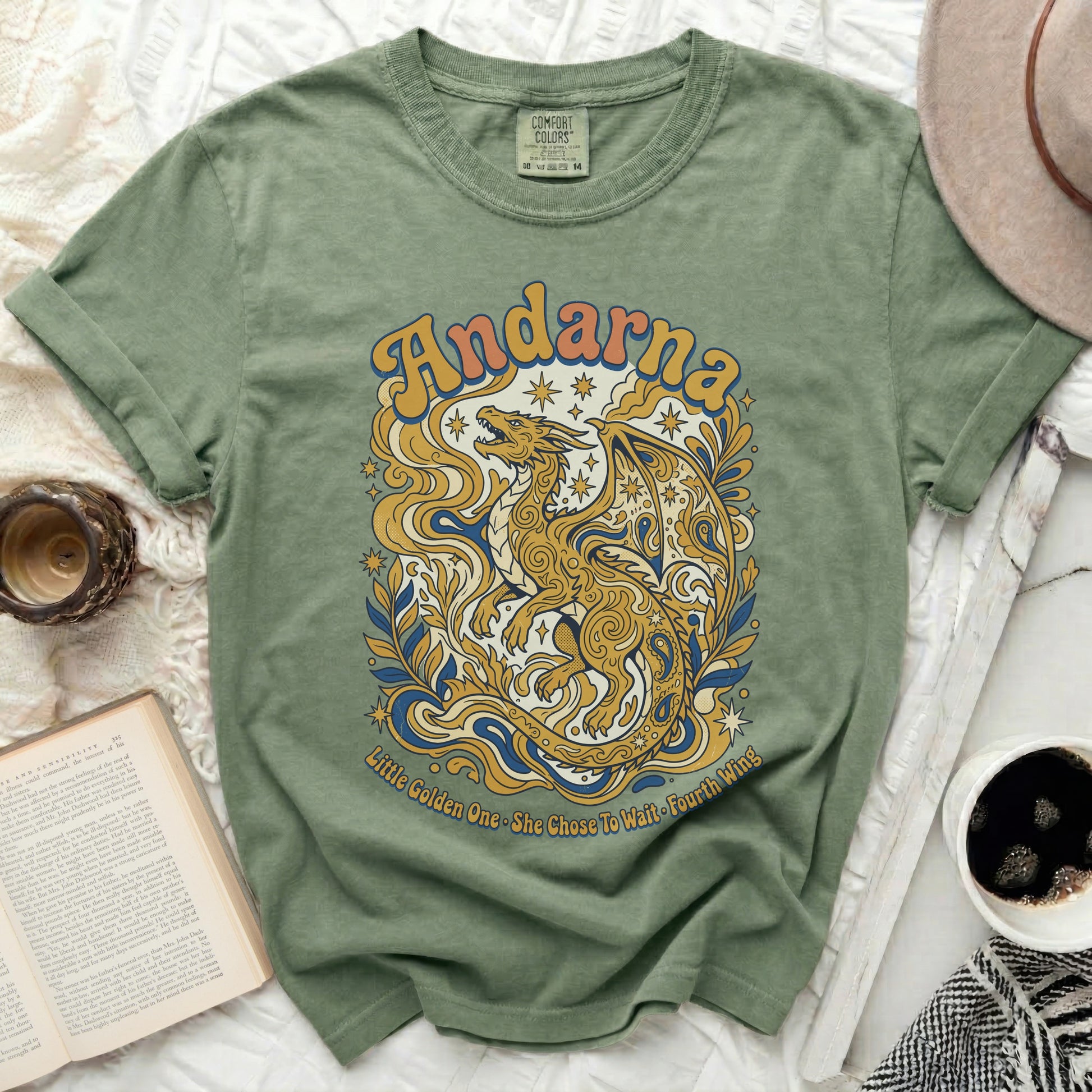 Green t-shirt with "Andarna" and dragon design, "Little Golden One. She Chose To Wait. Fourth Wing."