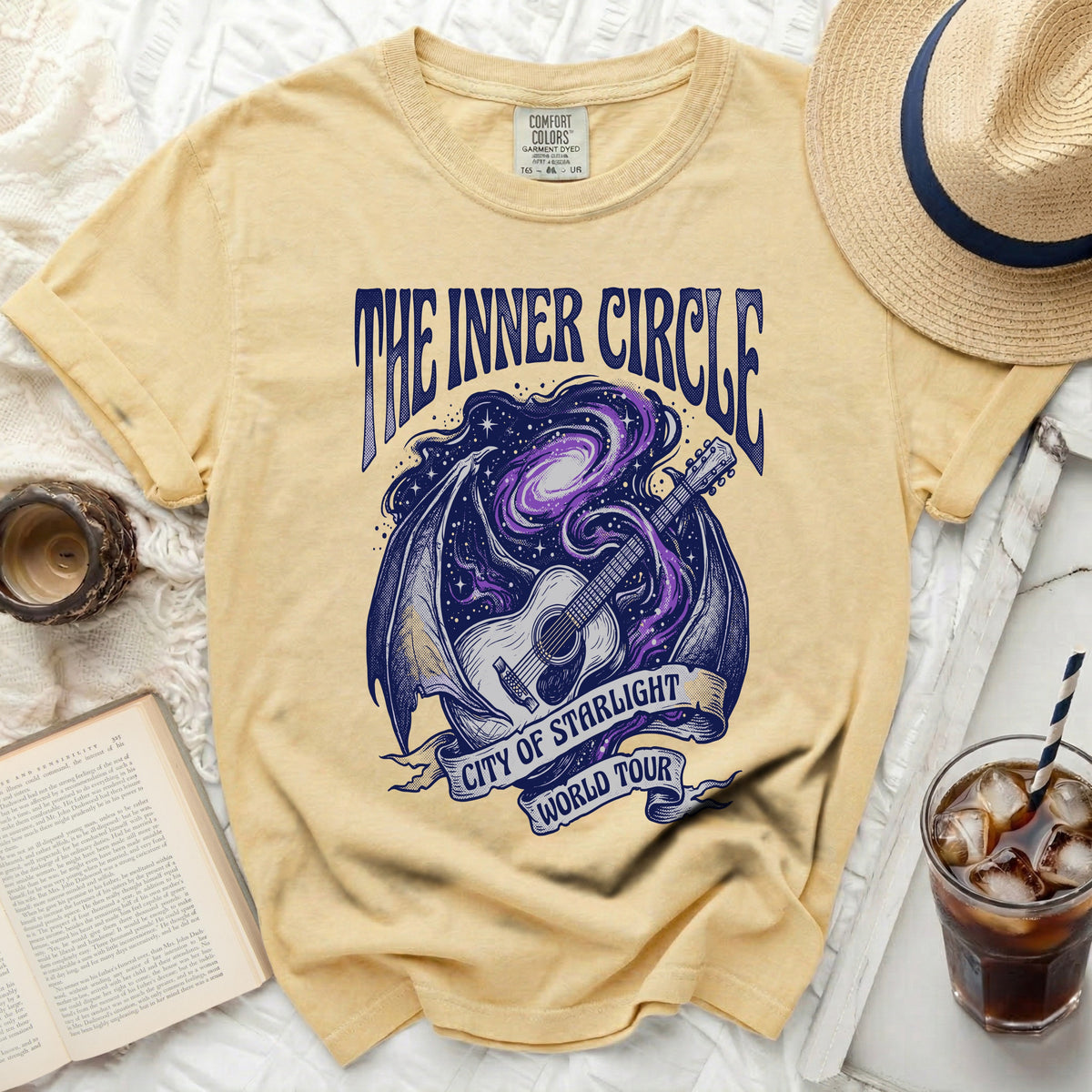 Yellow t-shirt with "The Inner Circle City of Starlight World Tour" graphic.
