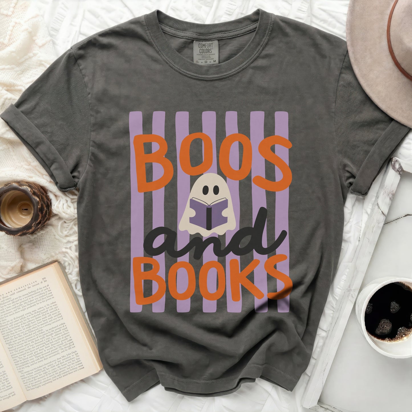 Dark gray t-shirt with "Boos and Books" Halloween graphic.