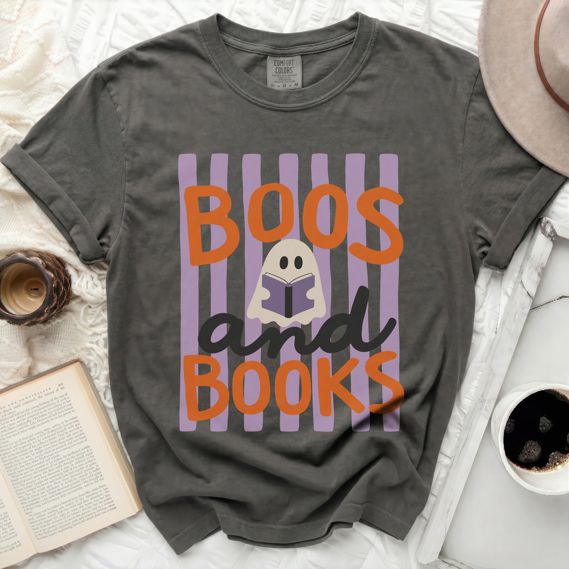 Dark gray t-shirt with "Boos and Books" Halloween graphic.