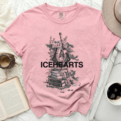Pink t-shirt with Icehearts London graphic and hockey sticks.